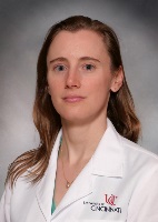 Image of Sardis Harward with UC lab coat