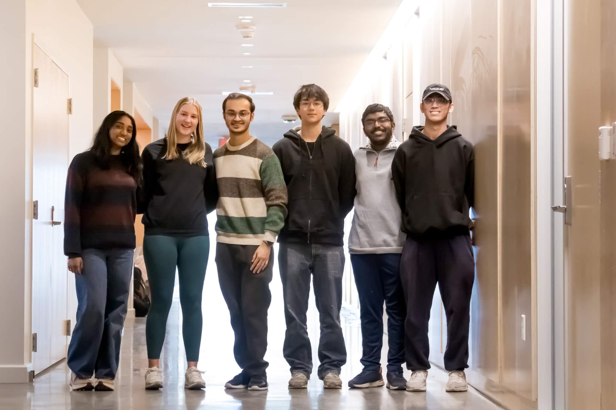 Raivath Mukherjee, founding member (on far left), pictured with other UC undergraduate students in SCORI.