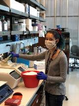 Photo of a lab member in the Luo Lab