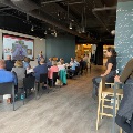 Group of people learning watching presentation