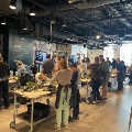 Group of people cooking during a food prep demo