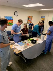 medical students learning to cook a healthy meal