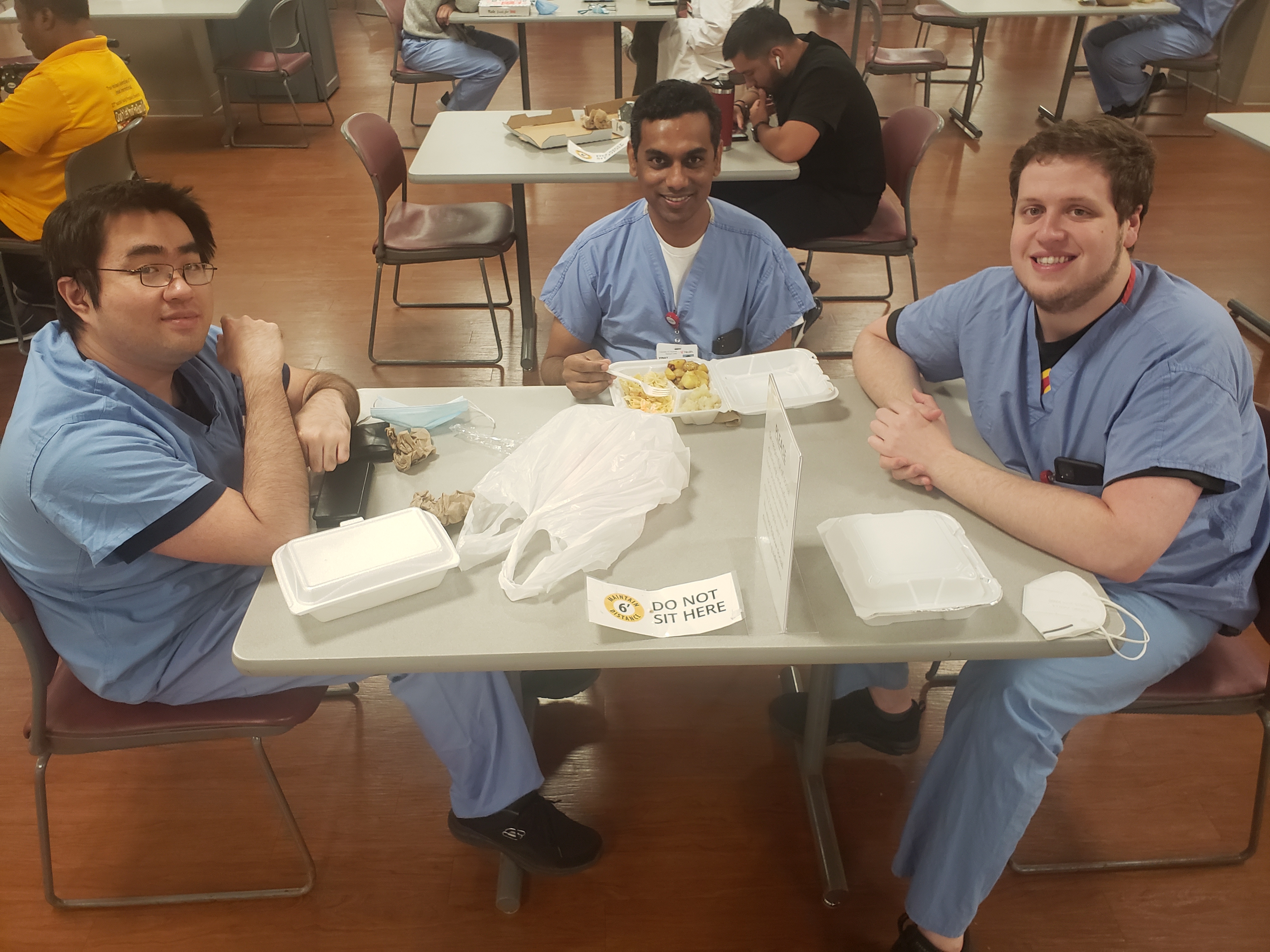 Three PGY2 Residents at Lunch in Cafeteria