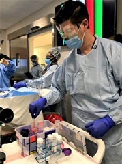 Man with testtubes