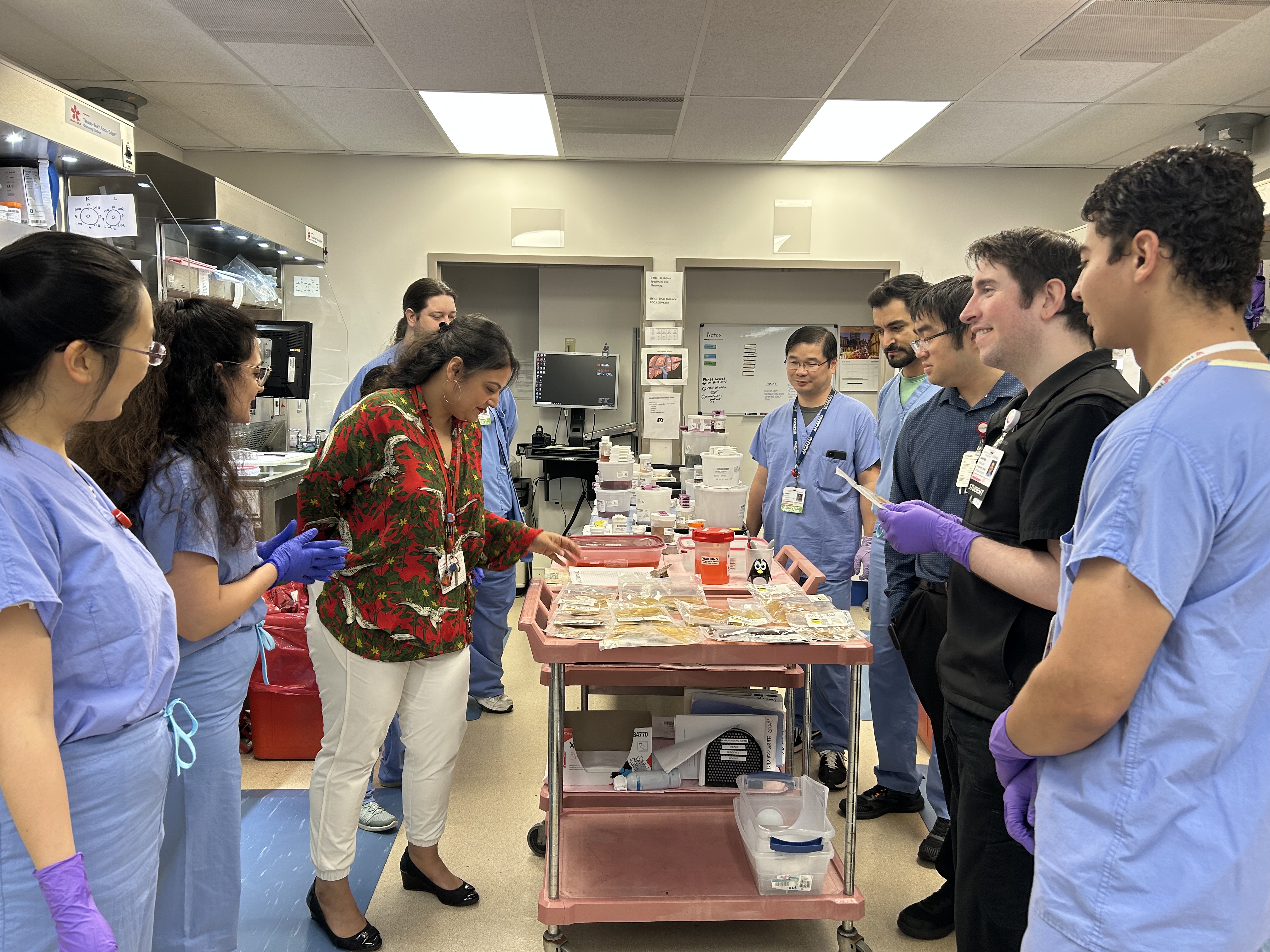 Dr. Sharma, Residents, Med Students and Observer in the lab
